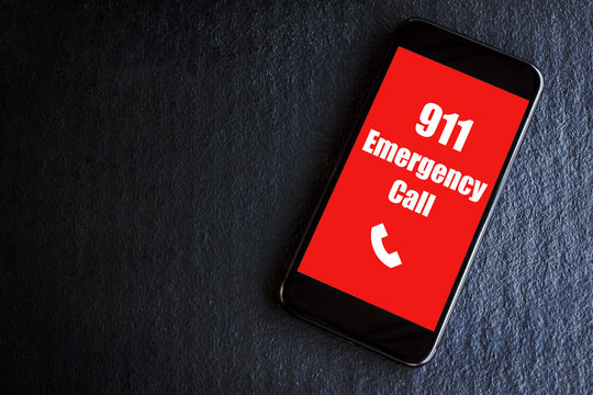 Emergency and urgency, 911 dialed on smartphone screen.