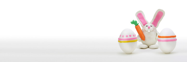 Plasticine Rabbit with easter egg and carrot.