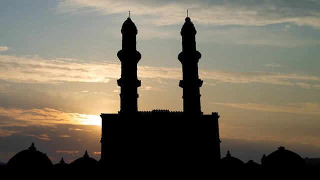 Jami Masjid or Jama Mosque: Time Lapse at Sunrise with Colorful Clouds , Champaner Pavagadh Archaeological Park, Gujarat, India