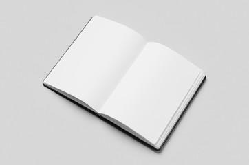 Notebook inside mockup on a grey background.
