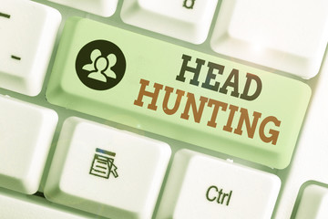 Conceptual hand writing showing Head Hunting. Concept meaning process of recruitment of a...