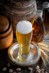 Light beer in a glass on the table