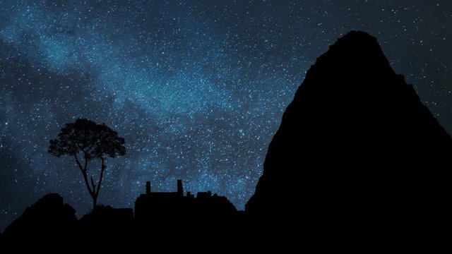 Machu Picchu: Time Lapse by Night with Stars, Milky Way, Ruins Ancient Inca city, and Huayna Picchu Mountain, Peru
