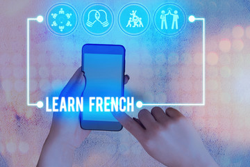 Conceptual hand writing showing Learn French. Concept meaning get knowledge or skill in speaking...