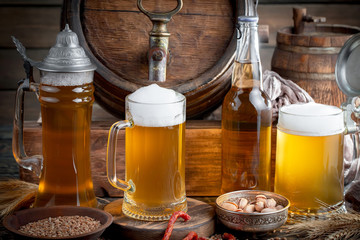 Light beer in a glass on the table