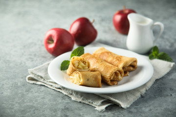 Crepes filled with apple and cinnamon