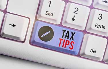Word writing text Tax Tips. Business photo showcasing compulsory contribution to state revenue...