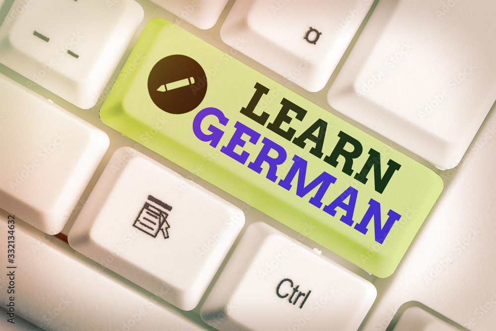 Poster writing note showing learn german. business concept for get knowledge or skill in speaking and writi