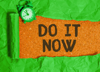 Conceptual hand writing showing Do It Now. Concept meaning not hesitate and start working or doing...