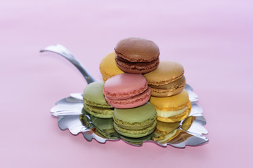 Colorful macaroons cake, sweet macaroon on white table background, food background