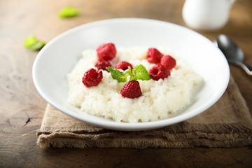 Homemade rice pudding with fresh raspberry