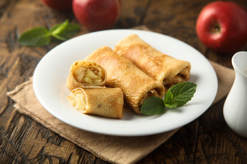 Crepes filled with apple and cinnamon