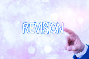 Writing note showing Revision. Business concept for action of revising over someone like auditing...