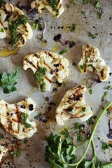 Grilled Cauliflower Steaks with Pesto Sauce.