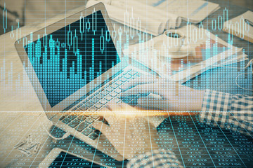 Fototapeta na wymiar Double exposure of forex graph with man working on computer on background. Concept of market analysis.