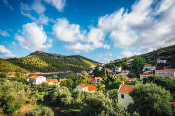 Fototapeta na wymiar Assos town village, Kefalonia island, Greece. Beautiful cloudscape in sky