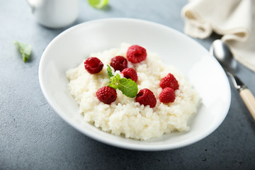 Homemade rice pudding with fresh raspberry