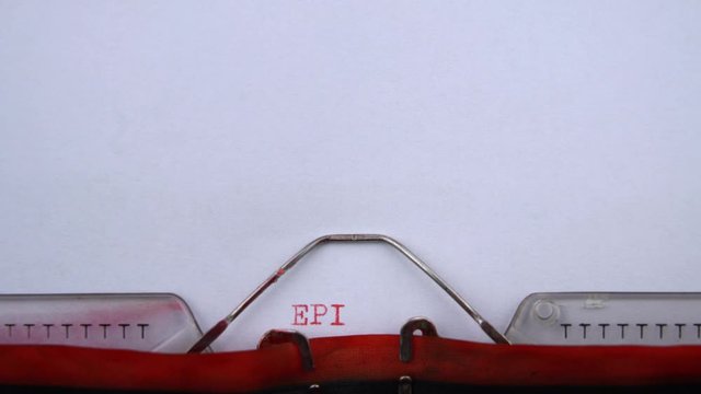Episode 5- phrase printed on an old typewriter in red letters, close up. vintage inscription