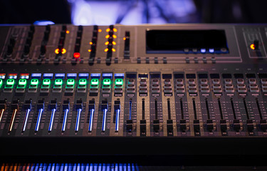 Digital mixer in a recording Studio. Work with sound. The concept of creativity and show business.