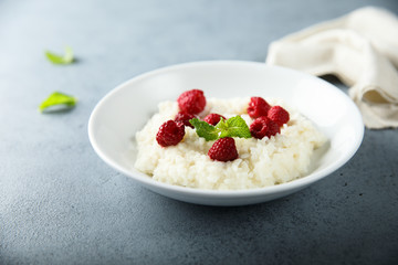 Homemade rice pudding with fresh raspberry