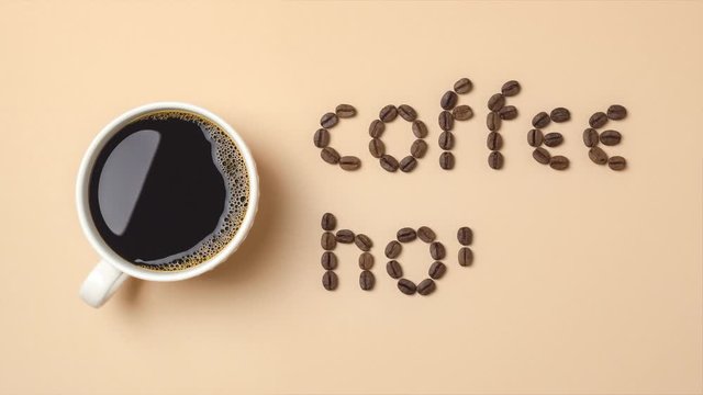 Roasted coffee beans arranged in letters