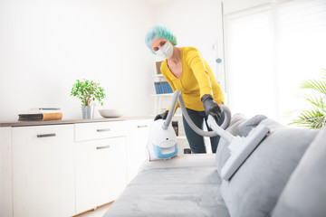 Home, apartment and room sterilization, cleaning, vacuuming with vacuum cleaner in the time of...