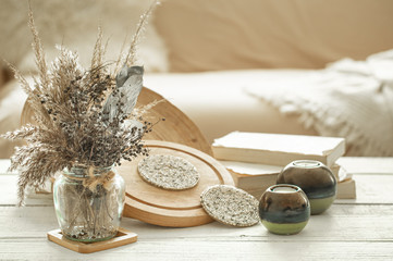 Decorative items in the interior with dried flowers.