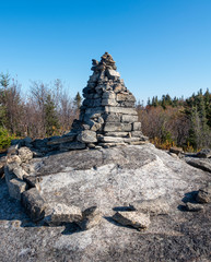 Tall Rock Cairn Surrounded by Stone Circle - 332150660