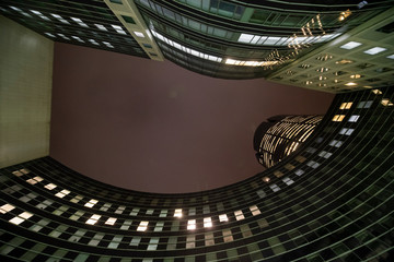 Obraz premium business office at night - corporate building