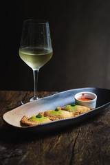 Chicken Empanadas La abuela style pastry puffs, spinach, green chimichurri sauce