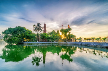 Tran Quoc pagoda in the afternoon in Hanoi, Vietnam. This pagoda locates on a small island near the southeastern shore of West Lake. This is the oldest Buddhist temple and tourist destination in Hanoi