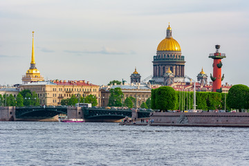 Fototapeta na wymiar Saint Petersburg cityscape with St. Isaac's cathedral, Rostral column and Admiralty, Russia