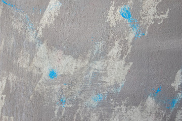 Blue paint on a concrete wall