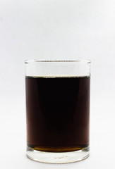 Cola drink in glass isolated on white background, copy space template.