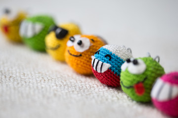 knitted emoticons , background