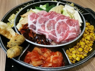Noodle vegetables and pork in a pot. Korean style restaurant in the mall thai