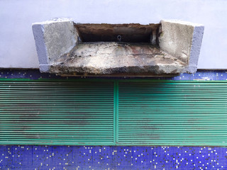 Rainwater drain on the wall of the building