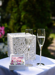 Wedding glasses stand on the table