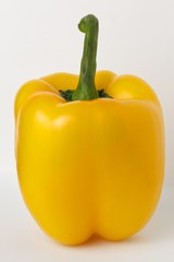 Yellow bell pepper on a white background