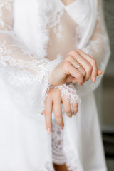 Morning bride in a bathrobe