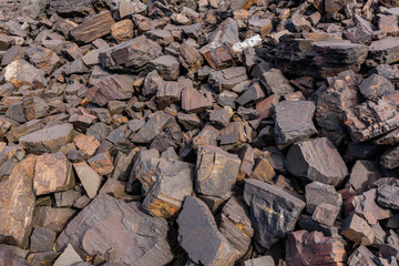 Background of stones near iron ore quarry