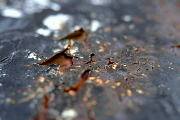 Abstract macro photography – black metal crack texture on a steel surface