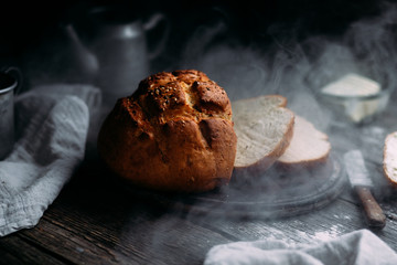 Wheat flour bread on the table. Sandwich with butter