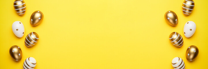 Easter eggs isolated on yellow background. For greeting card, promotion, poster, flyer, web-banner, article.