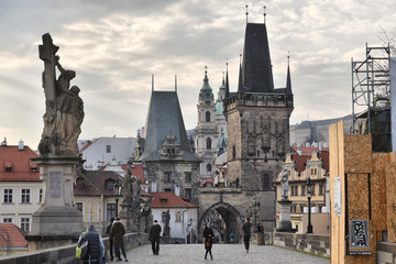 Naklejka na ściany i meble Prague during quarantine caused by Corona virus, Charles Bridge, gates