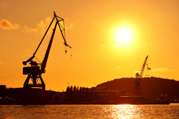 Dockside Cargo Crane and Evening Sun