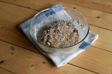Dough for homemade whole wheat bread in a bowl