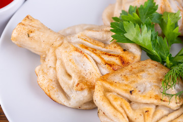 Roasted hinkals with greens