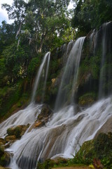 Waterfall in the green jungle in Cuba