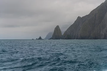 Fotobehang Scenic high rocks in the Pacific Ocean. Kamchatka Peninsula. © zhuxiaophotography